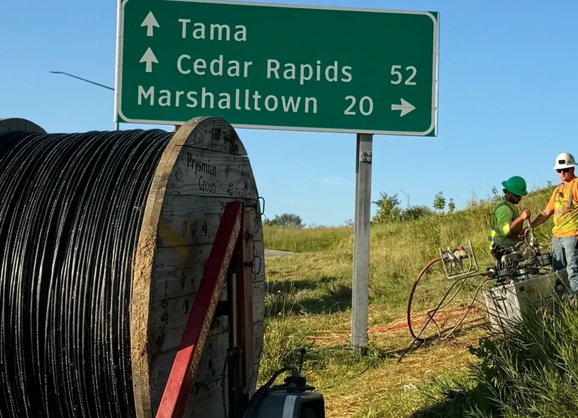 Highway sign with distance to cities